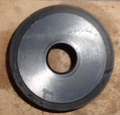 Metallic washer on a textured surface