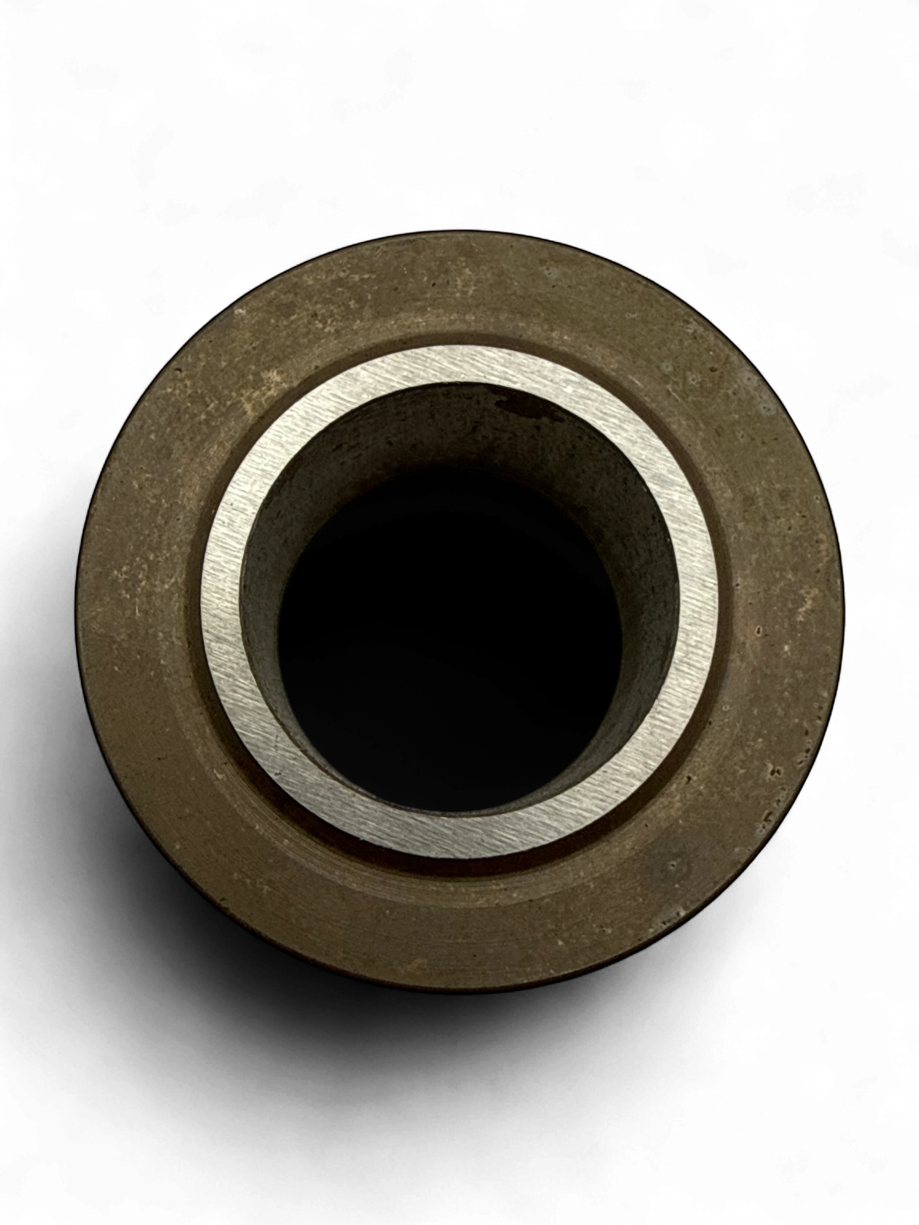 Range Supply Myers C35-20L pump cylinder liner replacement part with a metallic finish on a black background.