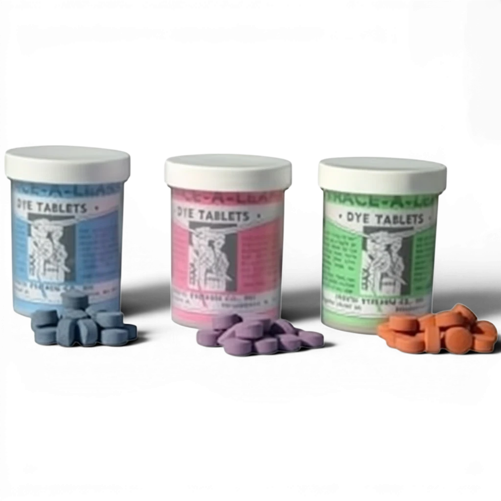Range Supply sewer dye tablets in blue, pink, and orange containers for leak detection and flow tracing.