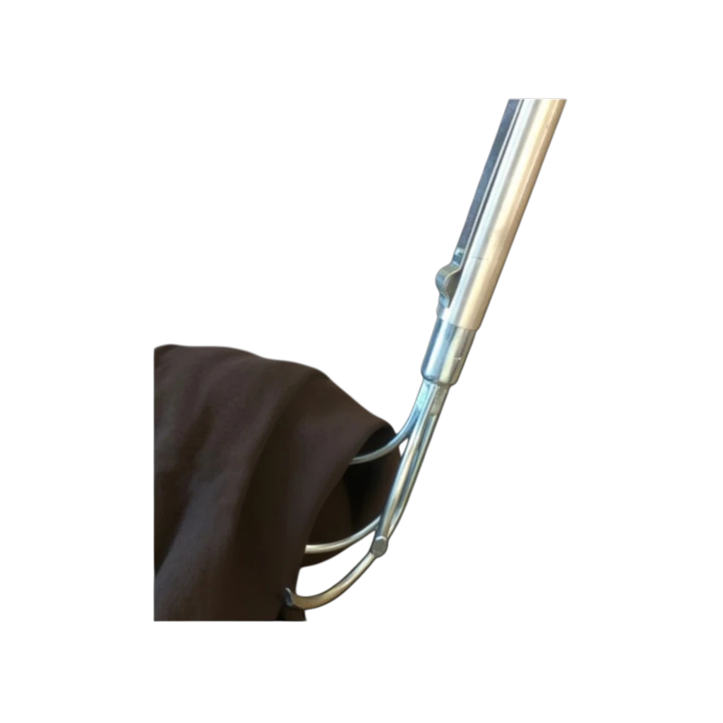 Sewershop 4-pronged metal debris grabber tool gripping a brown cloth, designed for sewer and manhole maintenance.