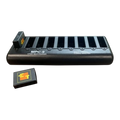 Sewershop Eartec EVADE 9-port battery charger with one rechargeable battery unit in black plastic housing