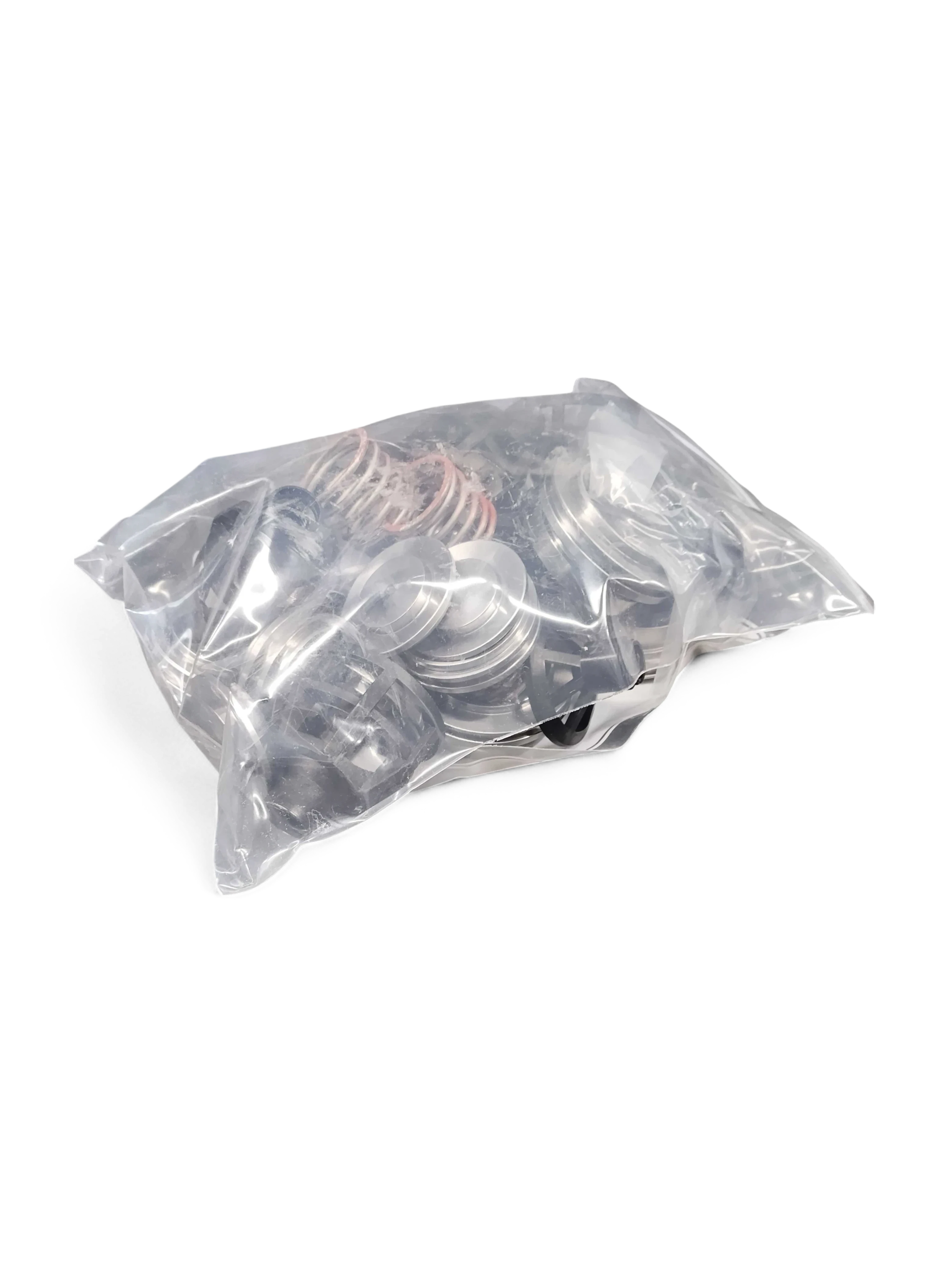 Sewershop GP5142 giant pump rebuild kit containing metal valve components and seals in a clear plastic bag