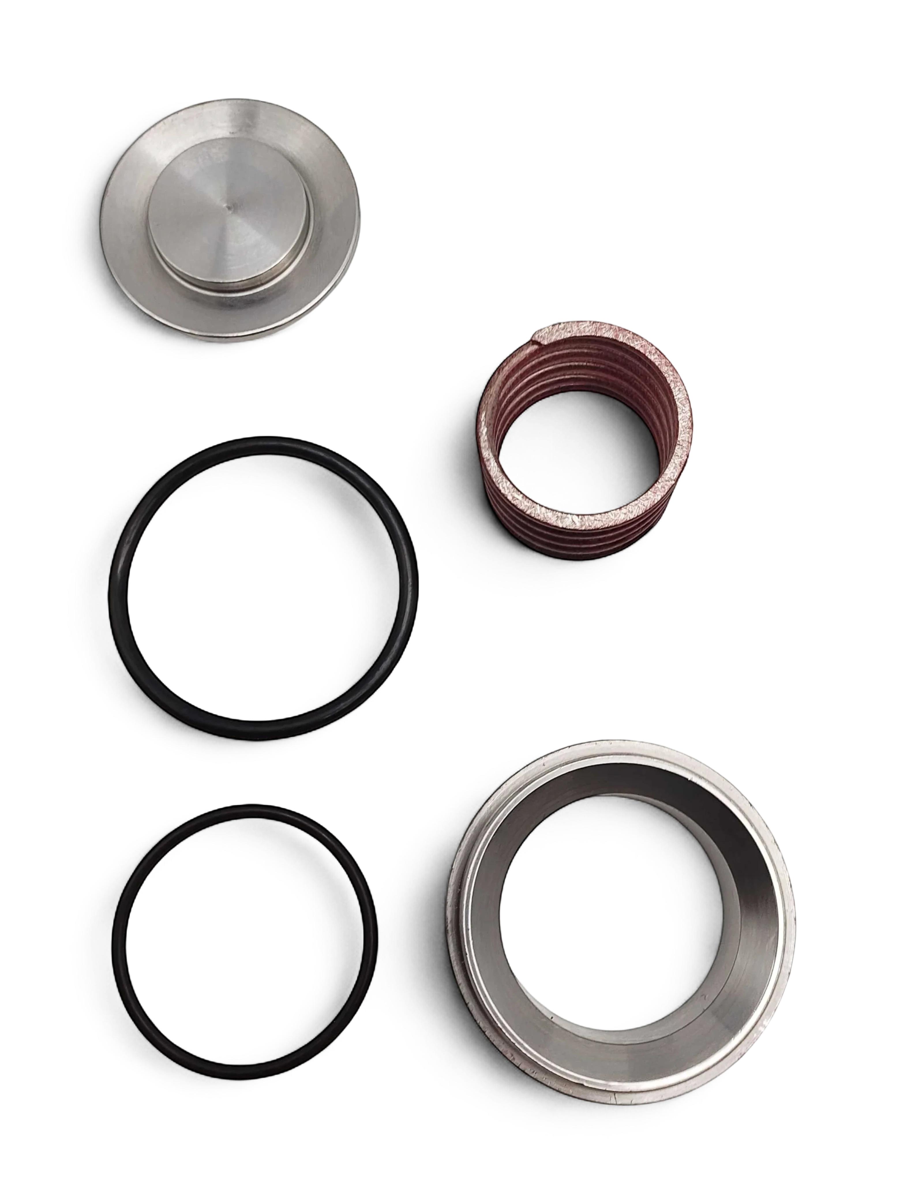 Sewershop GP5142 pump rebuild kit components including metal valve parts, springs, and black rubber O-ring seals.